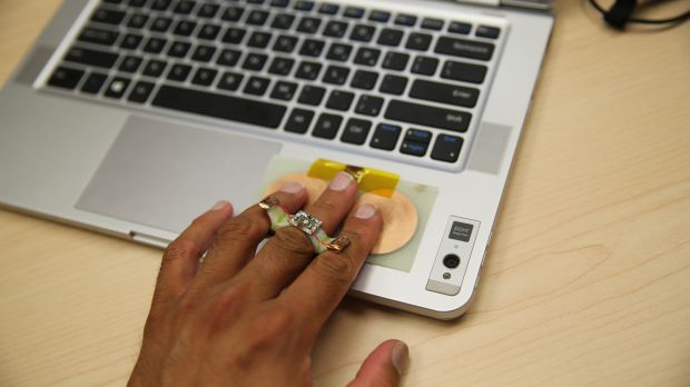Hand with wearable touching sensor to transfer data