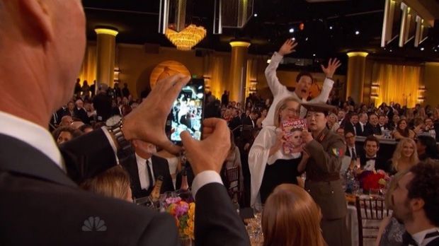 Benedict Cumberbatch photobombs Meryl Streep and Margaret Cho at the Golden Globes 2015