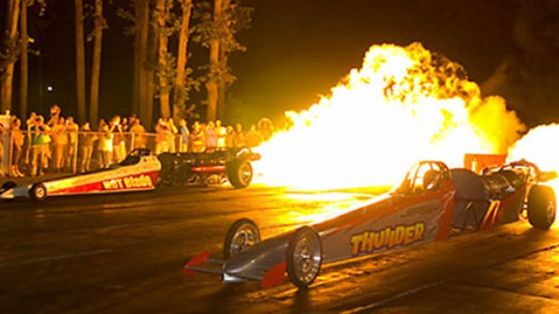 Dragster with flames coming out the exhaust