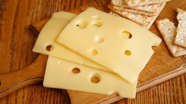 It's hay particles that form the holes in Swiss cheese