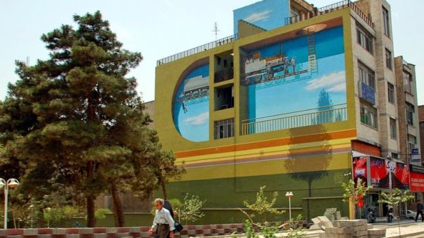 Artist transforms gray buildings into works of art in Tehran