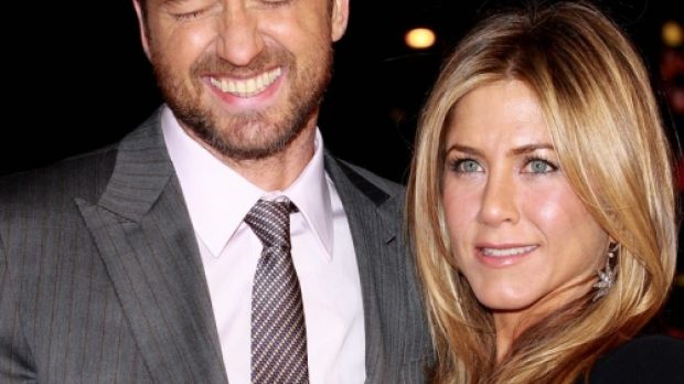 Jennifer Aniston and Gerard Butler on the red carpet at the UK premiere of “The Bounty Hunter”
