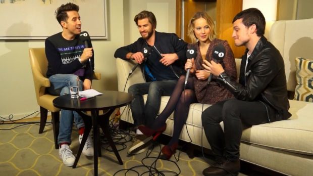 Liam Hemsworth, Jennifer Lawrence and Josh Hutcherson promote “Hunger Games: Mockingjay Part 1”