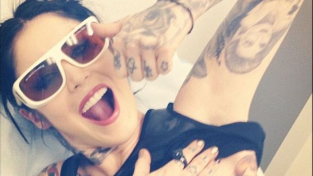 Kat Von D is getting ready to have Jesse James tattoo on her ribcage lasered off
