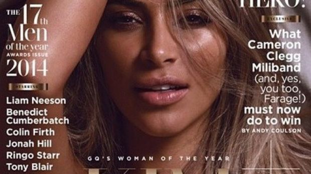 Kim Kardashian strikes a sultry pose for the cover of the British GQ