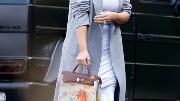 Kim Kardashian and her custom painted (by daughter Nori) Hermes Birkin bag