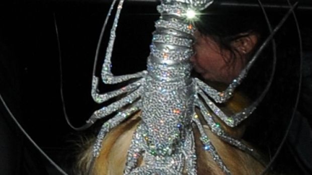 Lady Gaga steps out in London in bedazzled lobster hat and PVC outfit
