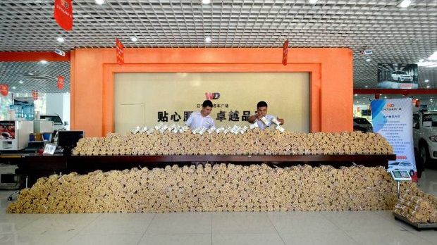 Man in China pays for new ride almost entirely in coins