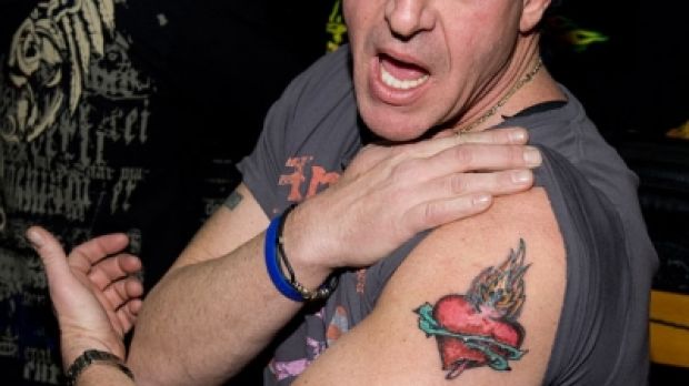 Michael Lohan shows off his brand new arm tattoo
