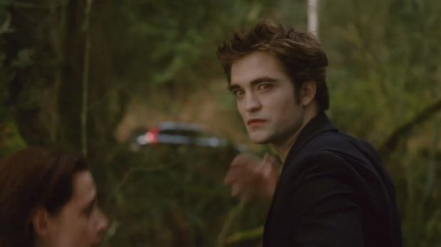 Screencap from new “New Moon” trailer showing the confrontation between Edward (Pattinson) and Jacob (Lautner), with Bella (Stewart) in the middle