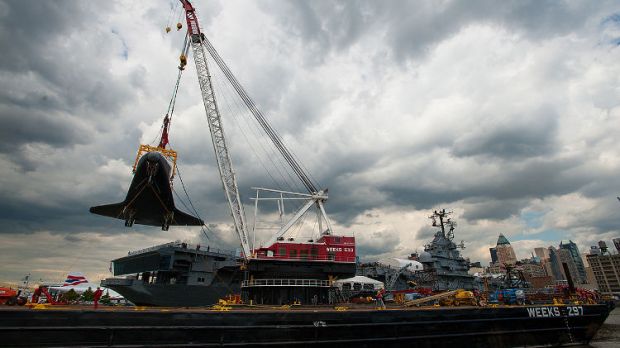 Enterprise being hoisted atop the Intrepid Museum, on June 6, 2012