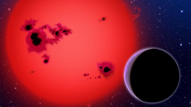 Artist's conception of the super-Earth discovered orbiting GJ1214, a dim red dwarf star located 40 light-years away