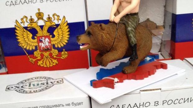 Vladimir Putin toy shows the Russian President riding a bear