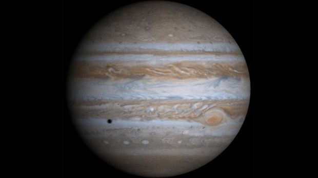 On January 23, Hubble saw three of Jupiter's moon crossing its surface