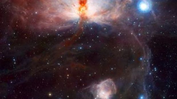 This image, the first to be released publicly from VISTA, the world’s largest survey telescope, shows the spectacular star-forming region known as the Flame Nebula