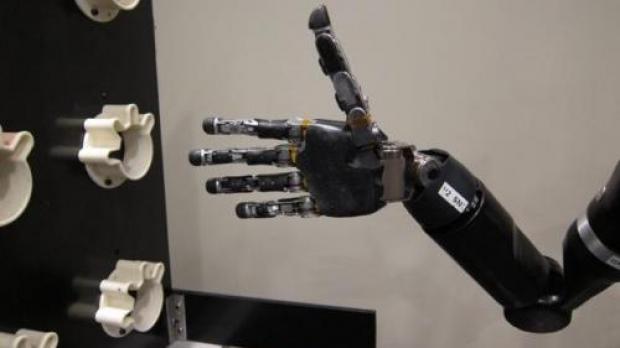 Prosthetic arm in thumbs up form