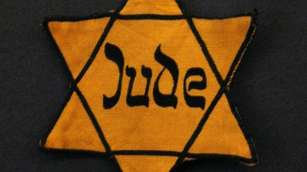A yellow Jewish star used in WW2 to mark Jewish people