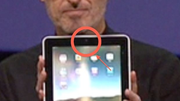 At the Yerba Buena Center for the Arts (San Francisco), Steve Jobs holds up his iPad demo unit for the attending crowd to see Apple's "latest creation"