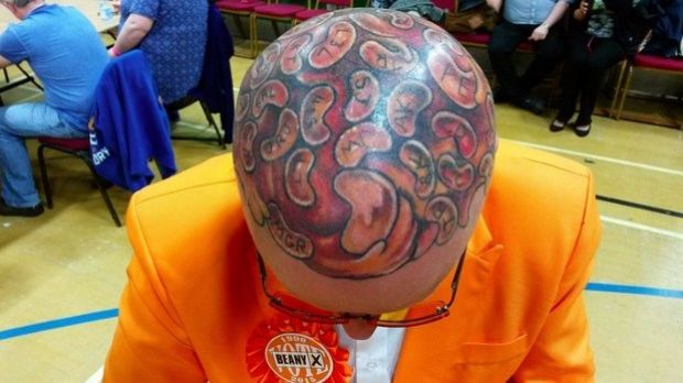 Man has 60 baked beans tattooed on his scalp