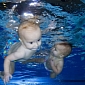 9-Month-Old Twin Babies Swim a 25-Meter Pool Length