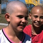 9-Year-Old Girl Banned from School After Shaving Head to Support Friend with Cancer