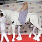 AMAs 2013: Lady Gaga Rode a Fake Horse on the Red Carpet – Video