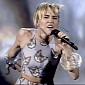AMAs 2013: Miley Cyrus and Lip-Synching Cat Do “Wrecking Ball” – Video