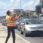 Amusing Panhandler Makes People Smile with His Unusual Signs
