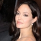 Angelina Jolie Says Madonna Only Adopts for Publicity, Fame