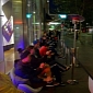 Apple Fans Patiently Wait in Line to Get the iPhone 5