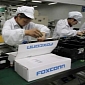 Apple Shares Fall Again as Foxconn Halts Hiring