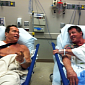 Arnold Schwarzenegger and Sylvester Stallone Chill on Hospital Bed