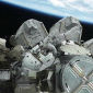 Astronaut Stuck on Broken Robotic Arm During Spacewalk
