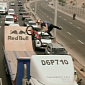BMX Champion Performs Tricks on Moving Truck Half-Pipe – Video