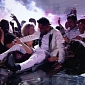 Billboard Music Awards 2013: Miguel Hits One Fan in the Head, Lands on Another’s Neck