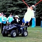 Bride and Groom Use Human Slingshot to Throw Bouquet, Garter