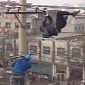 China: Drunk Man Climbs on Power Lines 9m (30ft) Above Ground