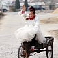 Chinese Woman Has Been Wearing a Wedding Dress Every Day for the Last Ten Years