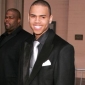 Chris Brown Denies Involvement in Rihanna Photo Scandal
