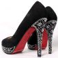 Christian Louboutin Sues YSL over Red Sole