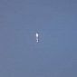 Cigar-Shaped UFO Hovers in the Sky in Britain – Video