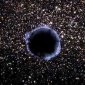 Colossal Black Hole Seen Drifting Away from Home Galaxy