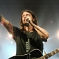 Dave Grohl Kicks Unruly Fan Out in Mid-Concert