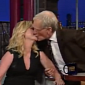 David Letterman Plants Surprise Kiss on Amy Poehler – Video