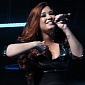 Demi Lovato Rips Own Hair Extension in Concert
