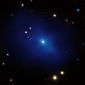 Distant Cluster Harbors Cold Quasar at Its Core