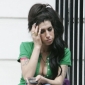 Drunk Amy Winehouse Passes Out on Pub Bench