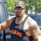 Dwayne Johnson and His Bulging Muscles Hit the Gym