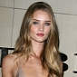 Every Girl Should Save for Louboutins, Rosie Huntington-Whiteley Believes