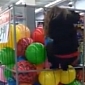 Girl Falls in Walmart Ball Rack in Epic Fail Video